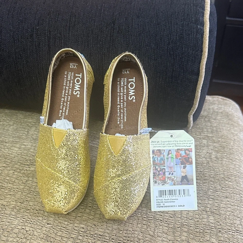TOMS Kids Glitter Slip-On Shoes in Gold size Y12